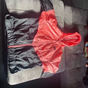 Black/pink Nike windbreaker